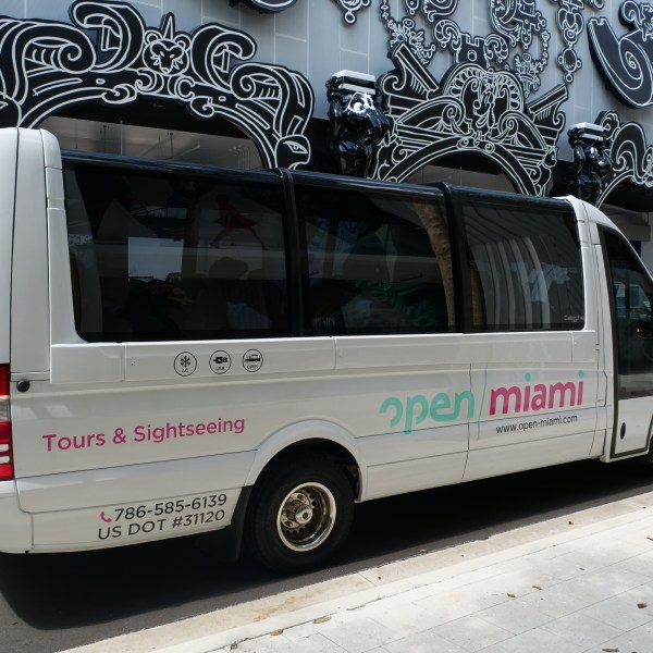 Open Miami Bus Panoramic Bus side view street view.