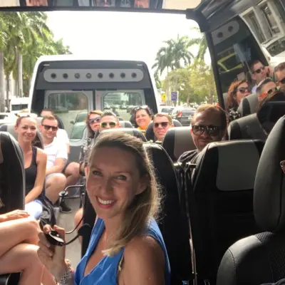 a group of people sitting on a bus