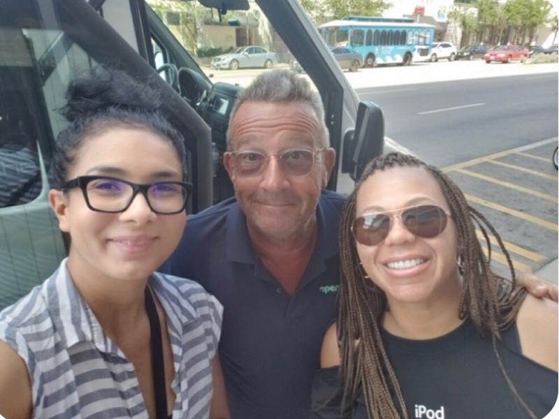 a group of people posing for the camera