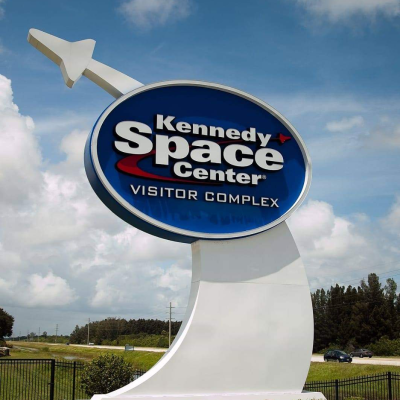 a sign on the side of a road