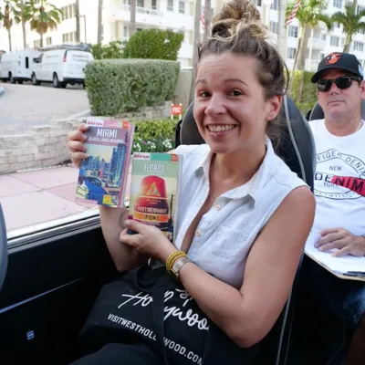 a person sitting posing for the camera