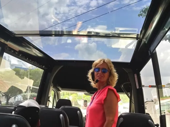 a person standing in front of a car