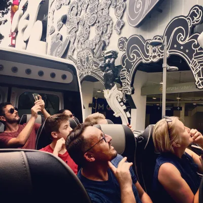 a group of people standing in front of a crowd