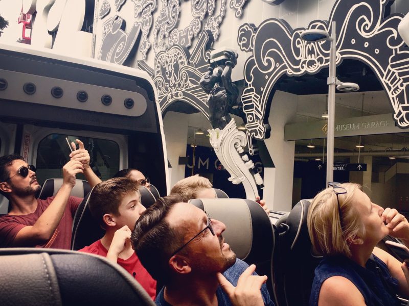 a group of people standing in front of a crowd