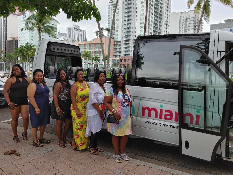 a group of people standing in front of a building