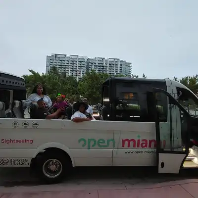 a group of people riding on the back of a truck