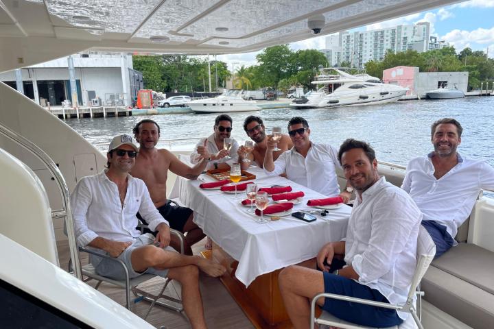 a group of people sitting at a table