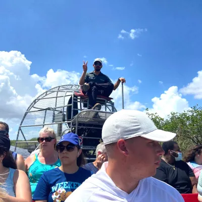 a group of people standing in front of a crowd