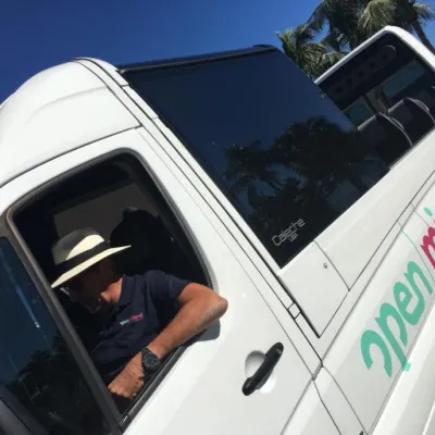 a person taking a selfie in a car